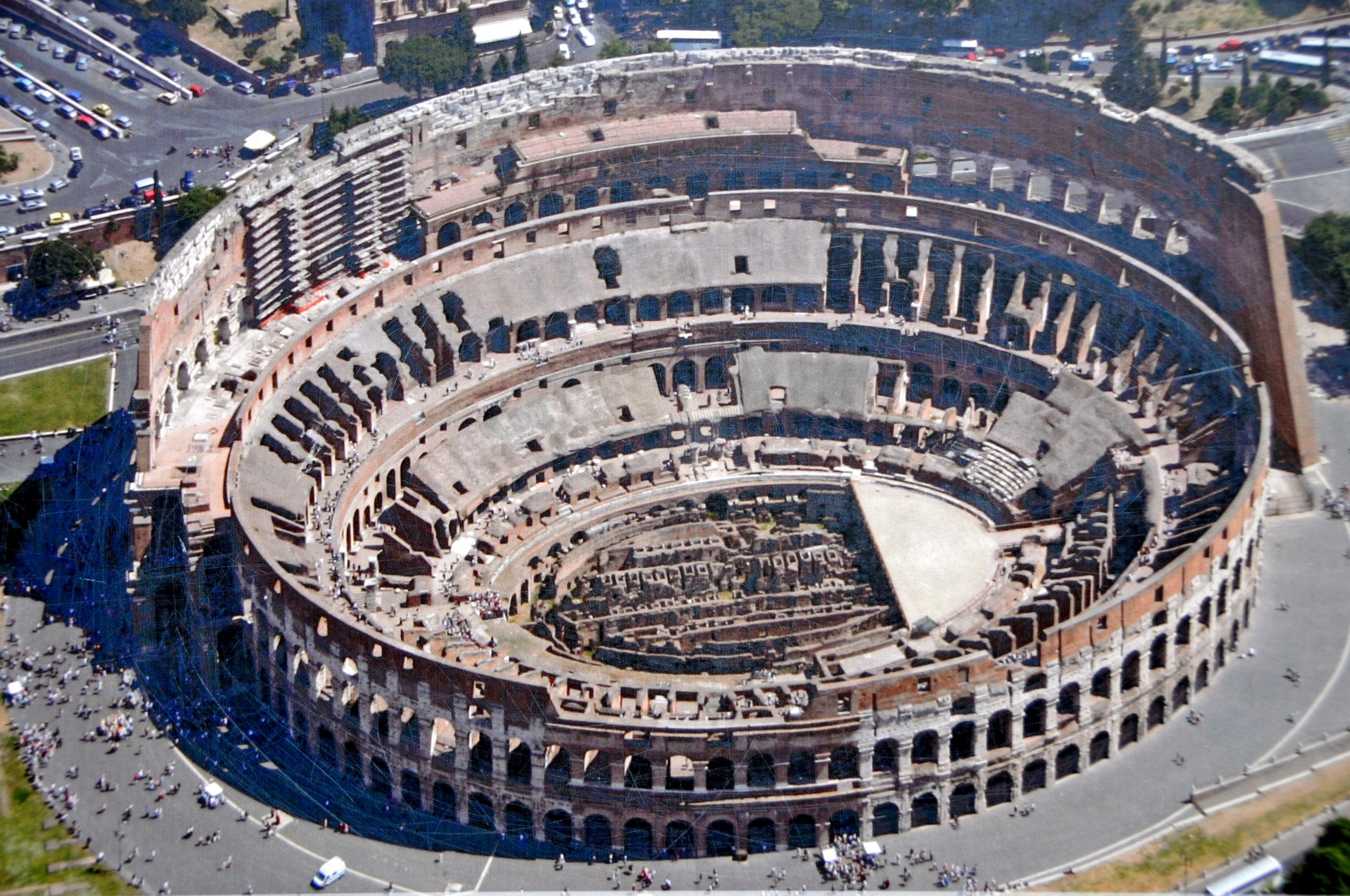 The Colosseum exterior, ideally shot from an angle that shows the scale and the different architectural orders on each level